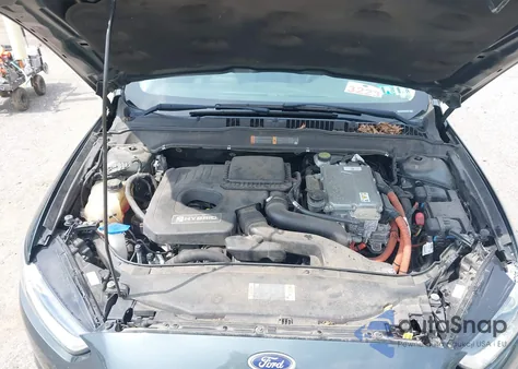 2015 Ford Fusion Hybrid S z USA, uszkodzony, nr VIN 3FA6P0UUXFR128490